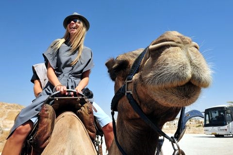 Tourist on a camel in Israel Tourist-Camel