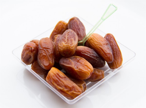 a container of dates a bowl of dates-cardiac health
