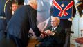 Sir Nicholas Winton (right) receives the Order of the White Lion from Czech President Miloš Zeman (left) at Prague Castle in Prague, Republic, on October 28, 2014.