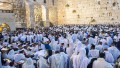 Jewish men gather at the Western (Wailing) Wall for prayer.